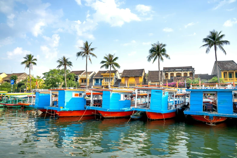 a number of boats in a body of water, pexels contest winner, ao dai, avatar image, high resolution photo, bright vivid color hues:1