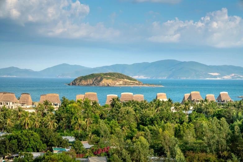 a large body of water surrounded by trees, pexels contest winner, bamboo huts, views to the ocean, in style of lam manh, thumbnail