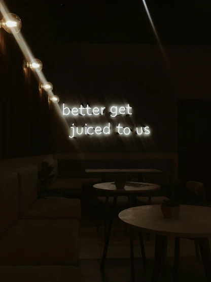 there is a neon sign that says better get juiced to us, unsplash contest winner, 💋 💄 👠 👗, ( ( theatrical ) ), profile image, cafe lighting