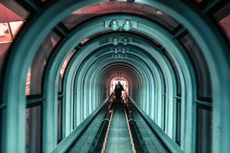 a person riding an escalator in a tunnel, unsplash contest winner, hyperrealism, beeple and james jean, thumbnail, multiple stories, an archway