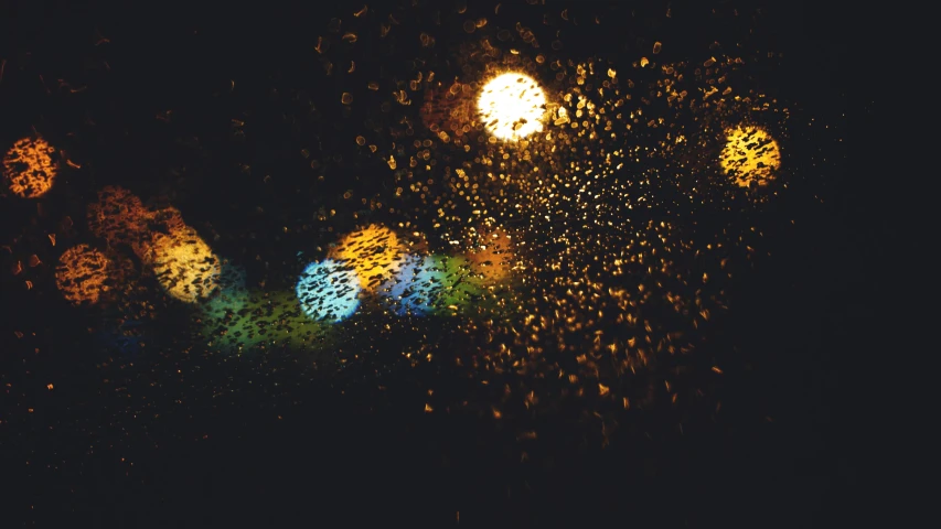 a close up of a street light on a rainy night, by Attila Meszlenyi, pexels, light and space, confetti, car lights, glitter gif, dramatic lighting - n 9