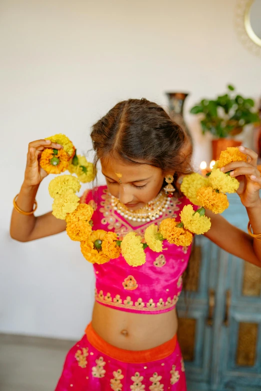 a young girl is putting flowers in her hair, trending on unsplash, hurufiyya, jeweled costume, wearing yellow croptop, necklace on display, organic and intricate