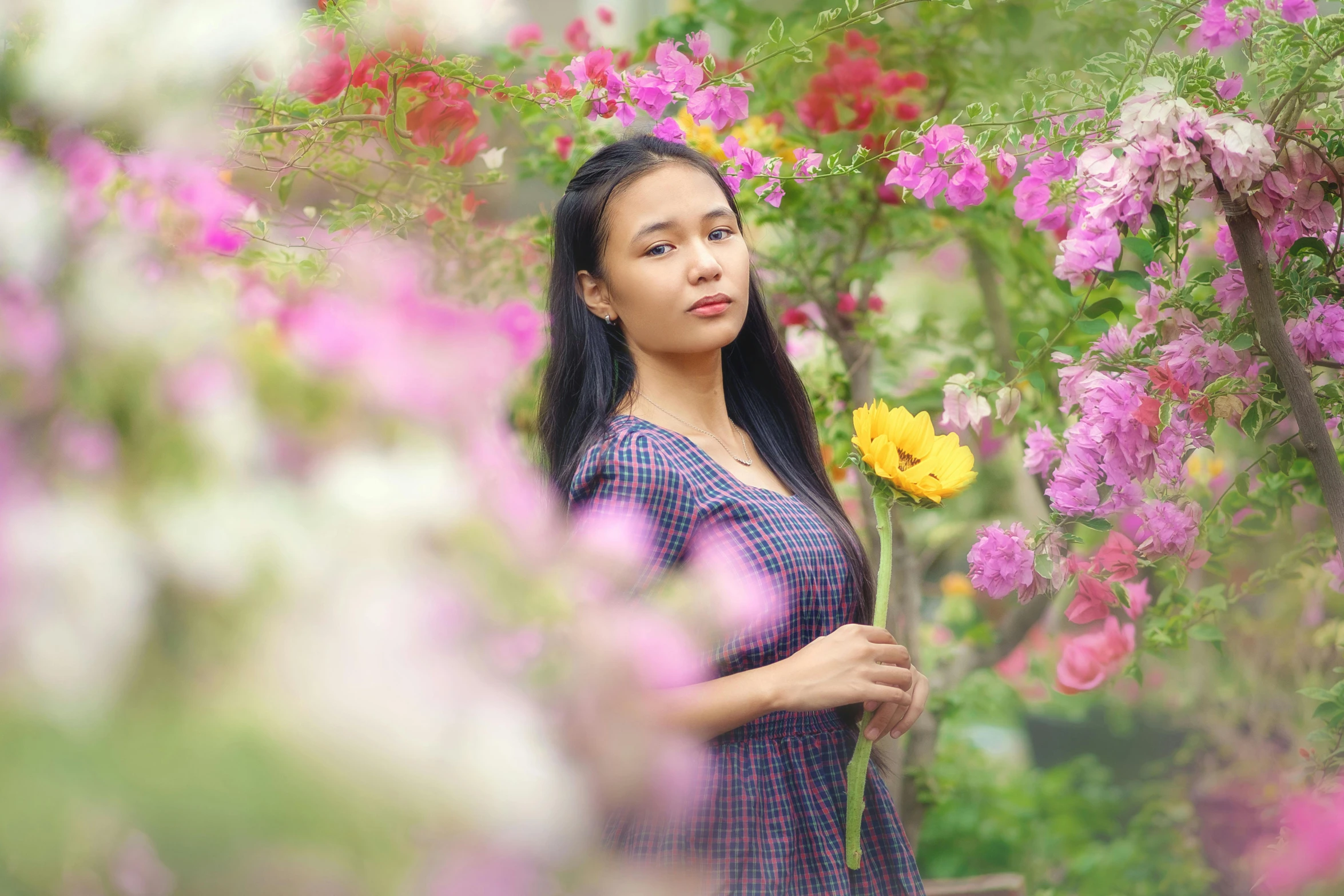 a woman standing in front of a bunch of flowers, pexels contest winner, beautiful asian girl, avatar image, outdoor photo, full frame image