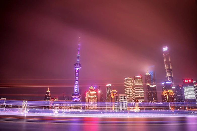 a long exposure photo of a city at night, inspired by Cheng Jiasui, pexels contest winner, futurism, purple and scarlet colours, shanghai, bright thin lasers, slide show