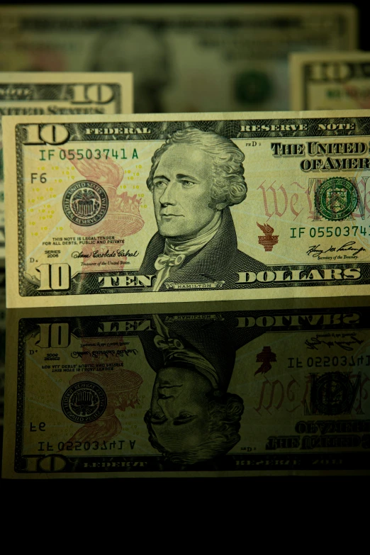 a bunch of money sitting on top of a table, alexander hamilton style, slide show, lgbtq, promo image