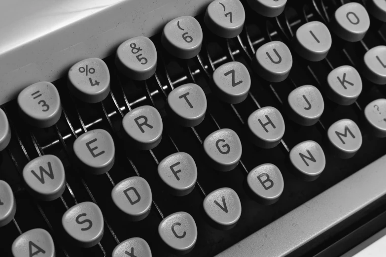 a black and white photo of an old typewriter, by John Hutton, pixabay, letterism, mechanical keyboard, in retro colors, detail, vintage - w 1 0 2 4