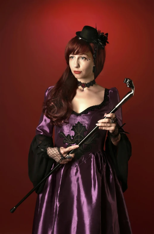 a woman in a purple dress holding a wand, inspired by Karl Bryullov, renaissance, felicia day, black metal rococo, high res, musician