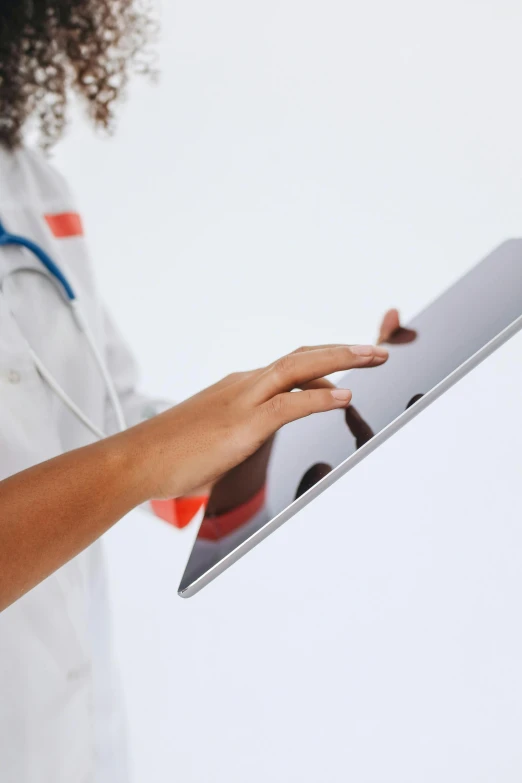 a close up of a person holding a tablet, med bay, standing sideways, (doctor), corners