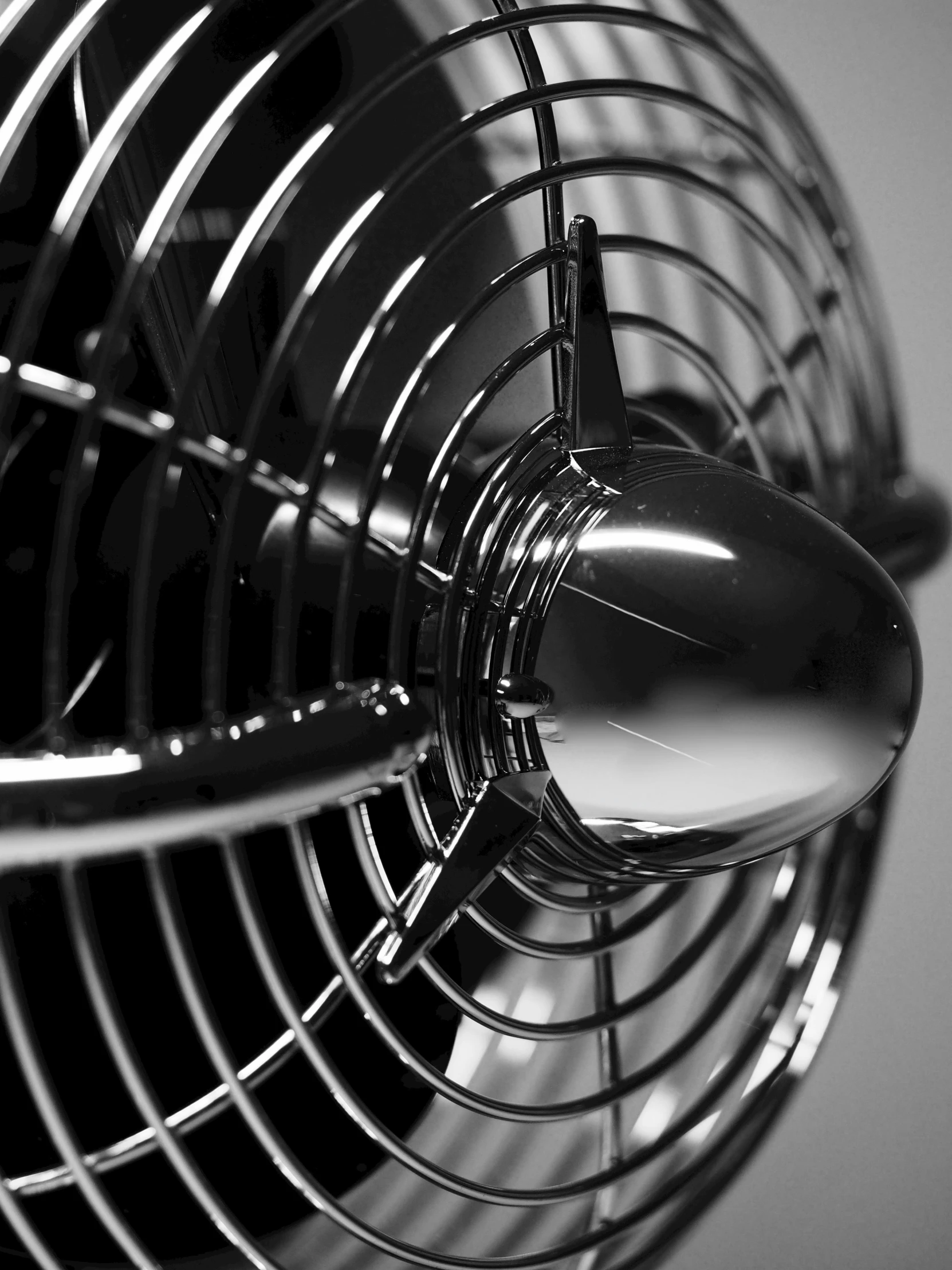 a black and white photo of a fan, by Steve Prescott, kinetic art, cinematic. by leng jun, professional product photo, ron cobb, up close image