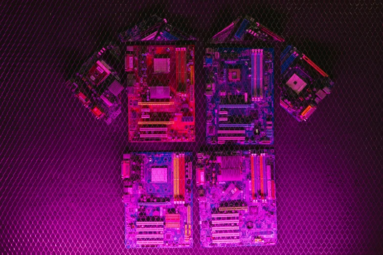 a group of electronic components sitting on top of a table, reddit, computer art, purple and pink leather garments, black light, motherboard, synthwave image