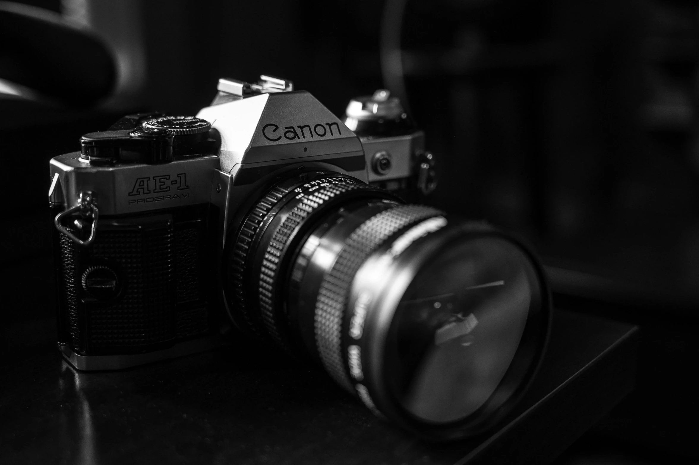 a black and white photo of a camera, by Adam Rex, unsplash contest winner, canon a 1, today\'s featured photograph 4k, medium format. soft light, medium format