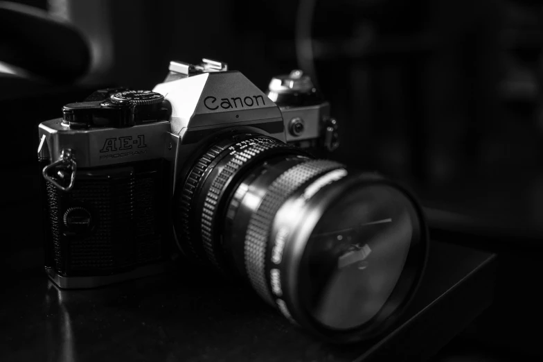 a black and white photo of a camera, by Adam Rex, unsplash contest winner, canon a 1, today\'s featured photograph 4k, medium format. soft light, medium format