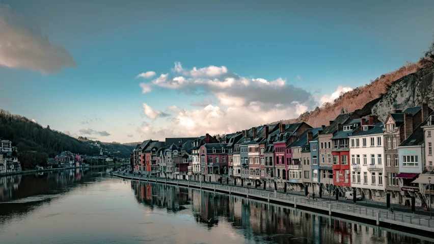 a row of buildings next to a body of water, pexels contest winner, art nouveau, liege, thumbnail, clannad, long cinematic shot