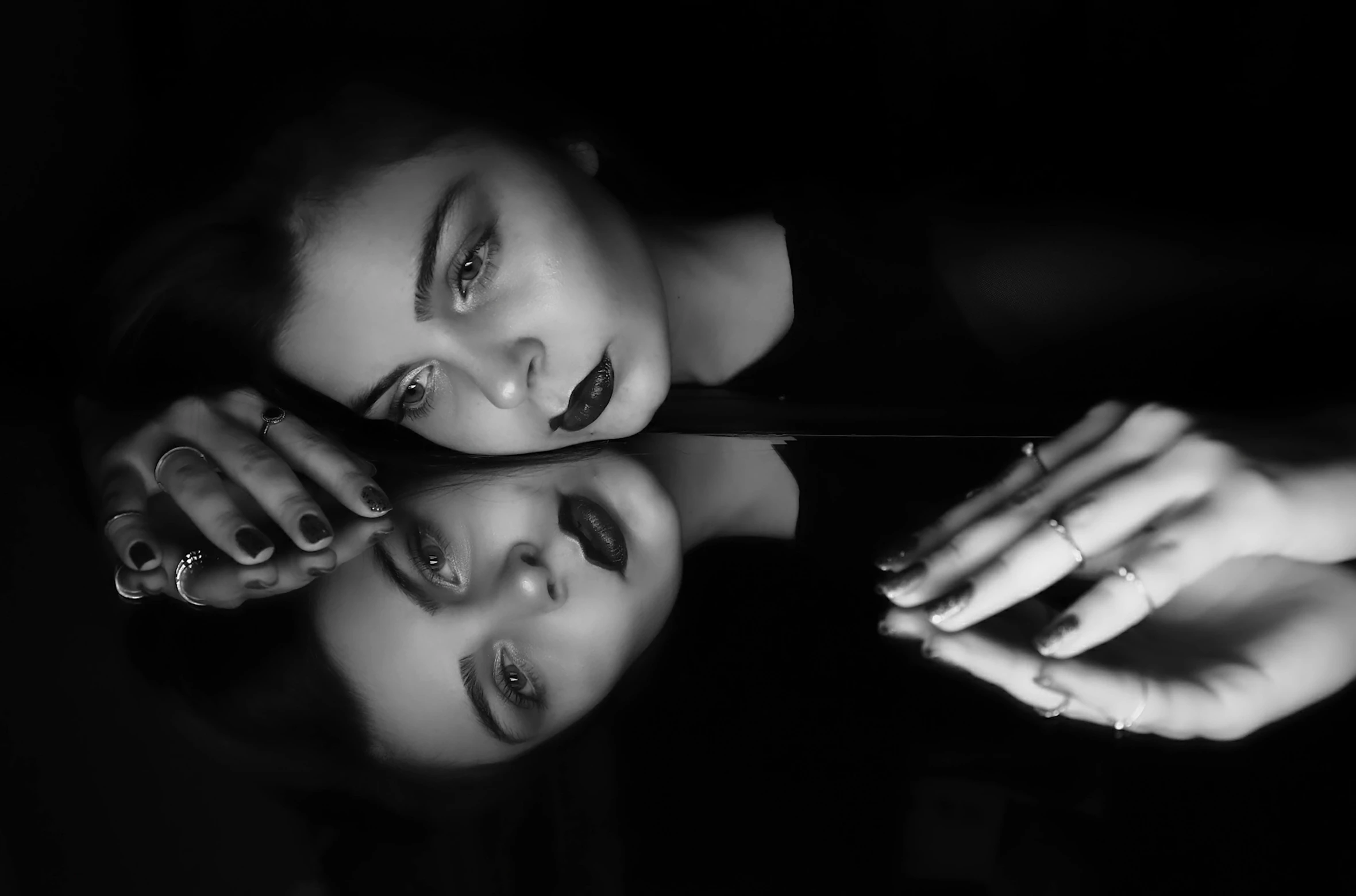 a black and white photo of two women, by Emma Andijewska, pexels, surrealism, mirror, black nails, portrait of florence pugh, portrait of a young witch