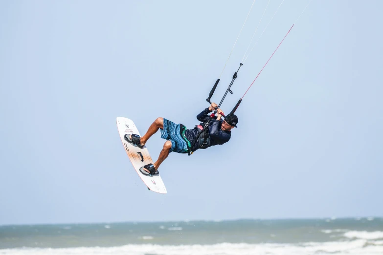a man flying through the air while riding a kiteboard, pexels contest winner, arabesque, avatar image, dune, full frame image, thumbnail