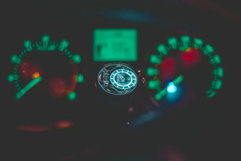 a close up of the dashboard of a car, inspired by Elsa Bleda, unsplash, green glow, dial, speeder, instagram photo