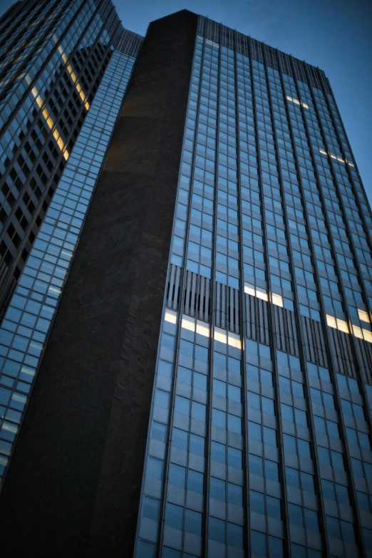 a couple of tall buildings sitting next to each other, an album cover, by Sven Erixson, unsplash, modernism, reflective glass, photographed for reuters, minneapolis, trump tower