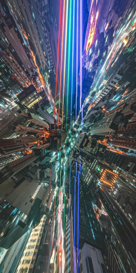 an aerial view of a city at night, inspired by Mike "Beeple" Winkelmann, unsplash contest winner, futurism, refracted color lines, low angle fisheye view, colorful wires, 8 k vertical wallpaper