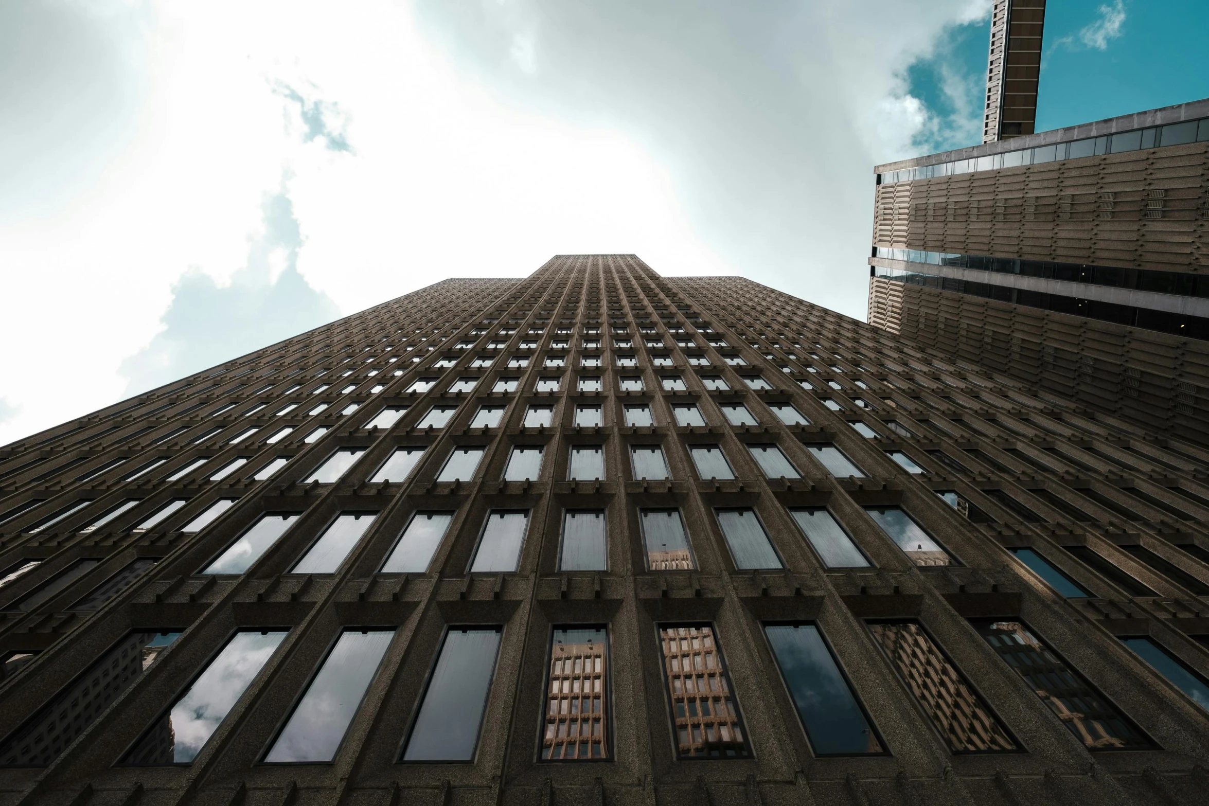 a very tall building with lots of windows, pexels contest winner, mies van der rohe, hyperrealistic image, ground view, magical buildings