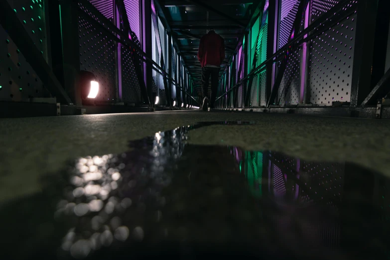 a person walking across a bridge at night, a 3D render, unsplash contest winner, reflective floor, slimy unreal engine, middle close up shot, reflecting light in a nightclub
