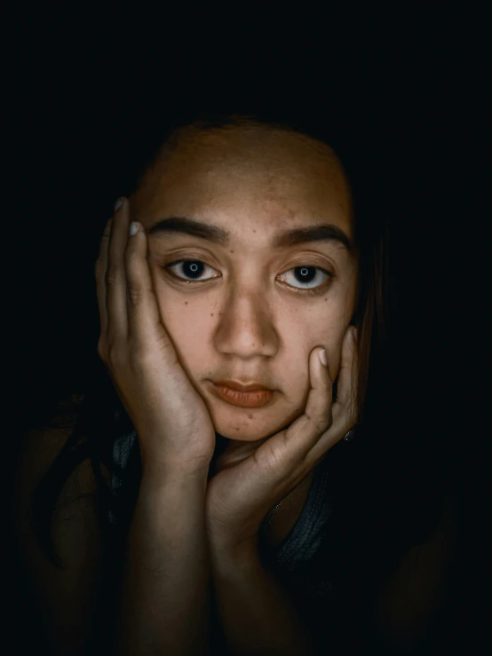 a woman with her hands on her face, a picture, trending on pexels, hyperrealism, late night melancholic photo, south east asian with round face, depressed girl portrait, taken in the early 2020s