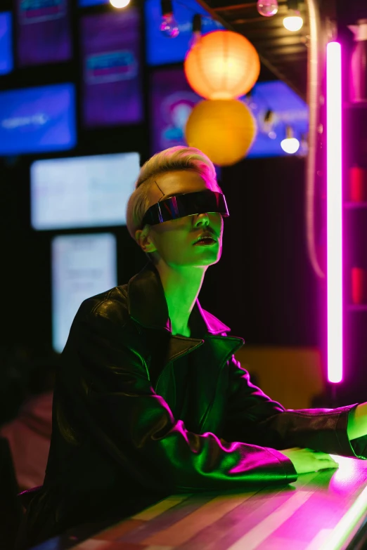 a woman sitting at a bar in front of neon lights, cyberpunk art, inspired by David LaChapelle, trending on pexels, wearing 3 d glasses, young blonde boy fantasy thief, cai xukun, max headroom