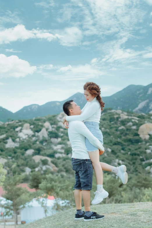 a man carrying a woman while standing on top of a hill, by Tan Ting-pho, unsplash contest winner, romanticism, square, cai xukun, 15081959 21121991 01012000 4k, headshot