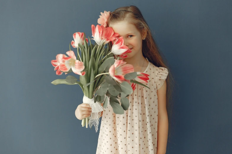 a little girl holding a bunch of flowers, in shades of peach, tulips, modelling, retro vibe