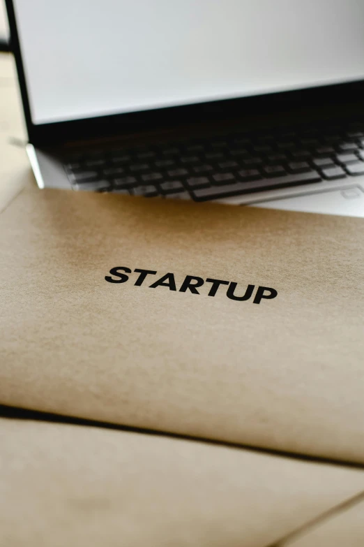 a laptop computer sitting on top of a wooden desk, by Carey Morris, trending on unsplash, incubator medpods, spacehip lands, thumbnail, small manufacture