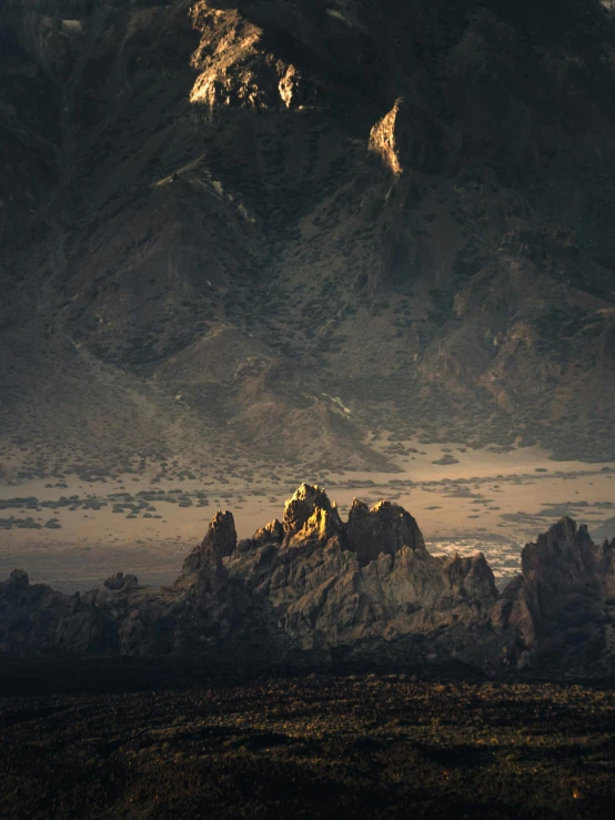 a couple of horses standing on top of a lush green field, a matte painting, inspired by Michal Karcz, unsplash contest winner, photo of shiprock, in a castle on an alien planet, “ aerial view of a mountain, late afternoon light