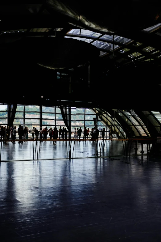 a group of people that are standing in a building, inspired by Andreas Gursky, unsplash, light and space, ballet, panorama view, black. airports, musee d'orsay 8 k