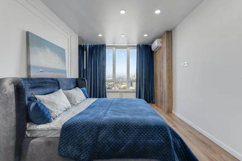 a bed sitting in a bedroom next to a window, grey and blue theme, zenith view, thumbnail, ultra quality