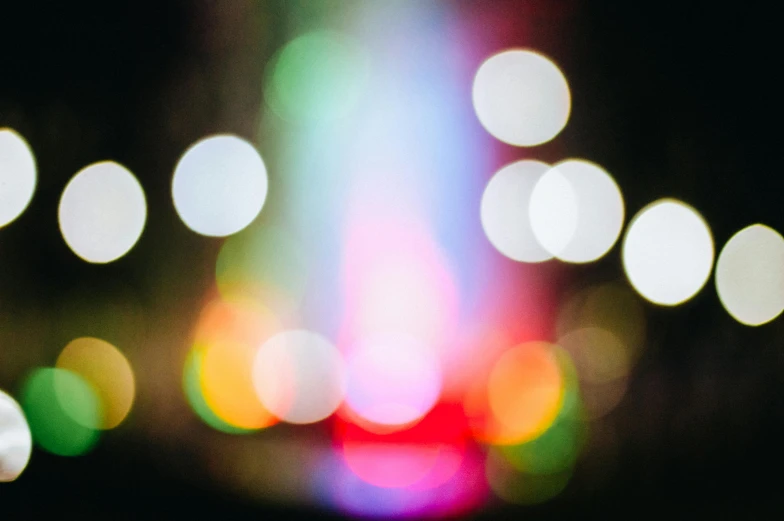 a blurry photo of a colorful fountain at night, unsplash, overcast bokeh - c 5, multicolor, ( colorful )
