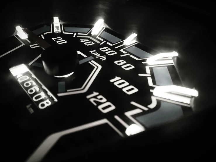 a close up of a speedometer on a black background, a 3D render, by Daniel Lieske, unsplash, game board, glowing leds, high resolution film render 100k, instagram picture