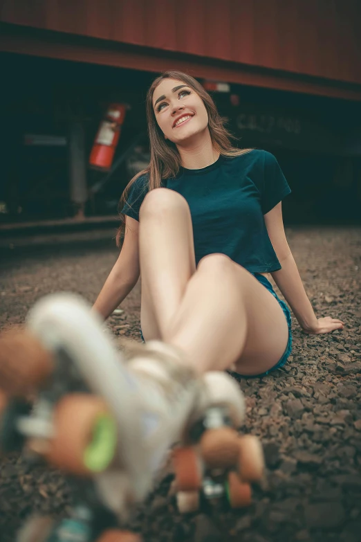 a woman sitting on the ground with a skateboard, by Matthias Stom, pexels contest winner, sexy girl wearing shorts, 15081959 21121991 01012000 4k, turning her head and smiling, trucks