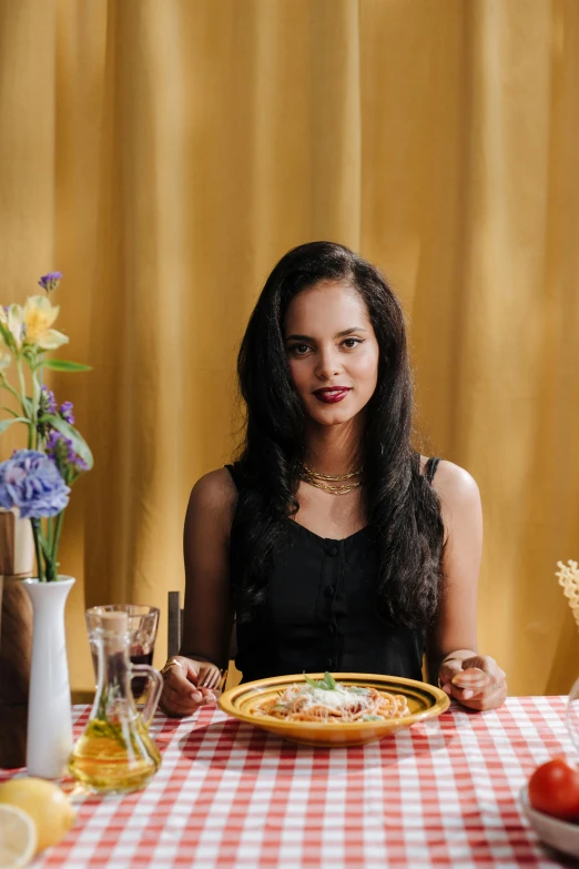 a woman sitting at a table with a plate of food, a portrait, pexels contest winner, renaissance, lana del rey and zoë kravitz, pasta, complex background, very handsome