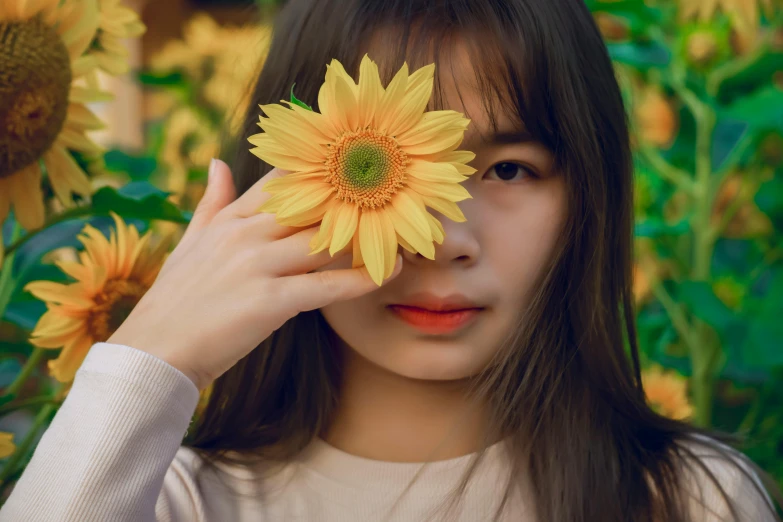 a woman holding a yellow flower in front of her face, a picture, inspired by Xie Sun, trending on pexels, korean girl, an ai generated image, high quality image, asian girl with long hair