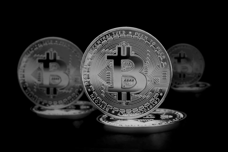 a group of bitcoins sitting on top of each other, pixabay, black and silver, digital banner, background image, splash image