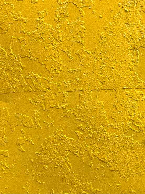 a close up of a yellow painted wall, flickr, intense subsurface scattering, detailed product image, textured 3 d, color”