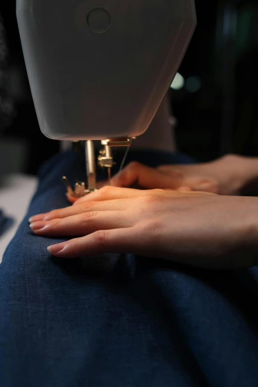 a close up of a person using a sewing machine, during the night, modelling, hands, uploaded