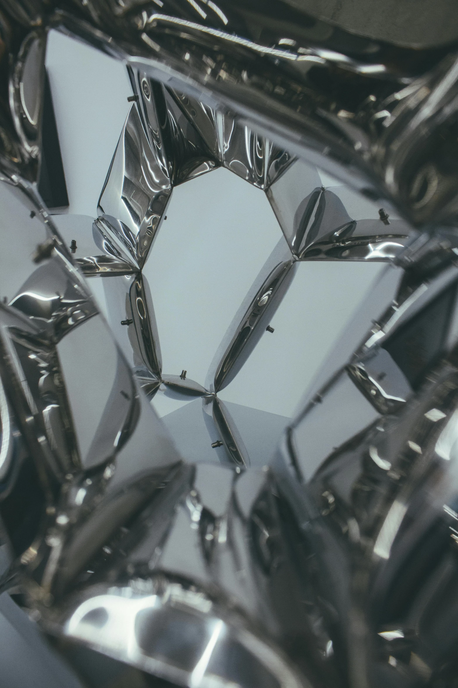 a close up of a shiny metal object, inspired by Patrick Pietropoli, unsplash, crystal cubism, kanye west album cover, video still, crystal formation, 'untitled 9 '