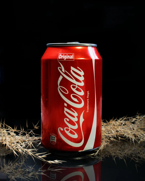 a can of coke sitting on top of a table, with a black background, profile image, promo image, fan favorite