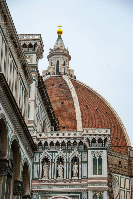 the dome of a building with a clock on it, inspired by Michaelangelo, renaissance, orange roof, cathedral in the background, olive green and venetian red, seen from afar