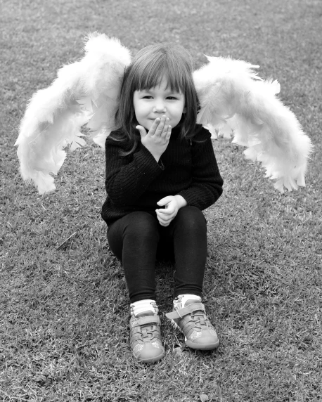 a black and white photo of a little girl with angel wings, pexels contest winner, fluffy ears and a long, may gibbs, had, each having six wings