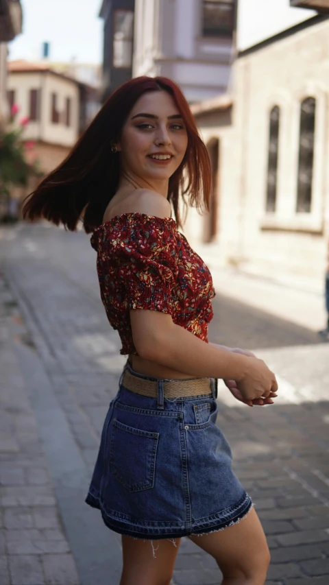 a woman riding a skateboard down a street, an album cover, by Attila Meszlenyi, pexels contest winner, renaissance, off the shoulder shirt, young beautiful amouranth, croptop, 15081959 21121991 01012000 4k