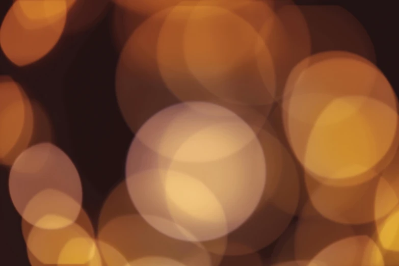 a close up of a bunch of lights, an album cover, tonalism, gradient brown to white, light circles, lighting 8k, ambient amber light