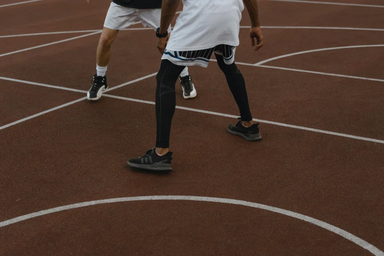 a couple of men standing on top of a tennis court, trending on dribble, gray shorts and black socks, running sequence, wearing basketball jersey, visible veins