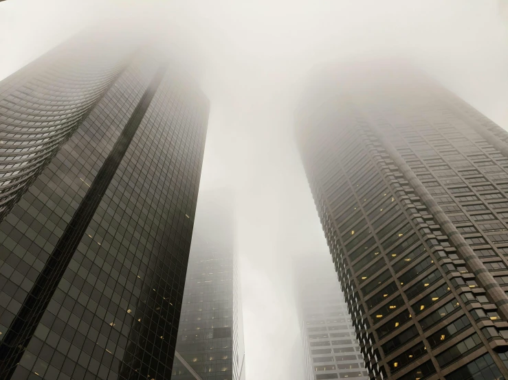 tall buildings in a city on a foggy day, pexels contest winner, surrealism, three towers, toronto, ignant, hyper-realism