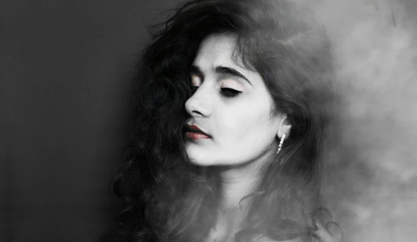 a black and white photo of a woman with long hair, by Max Dauthendey, archan nair, natalia dyer, profile pic, portait photo profile picture
