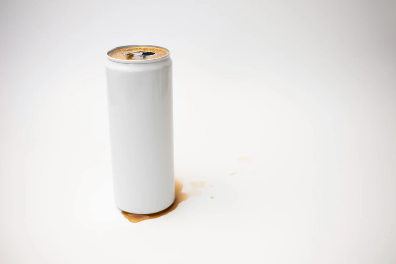 a can of soda sitting on top of a table, postminimalism, white background : 3, spilt coffee, detailed product image, ignant